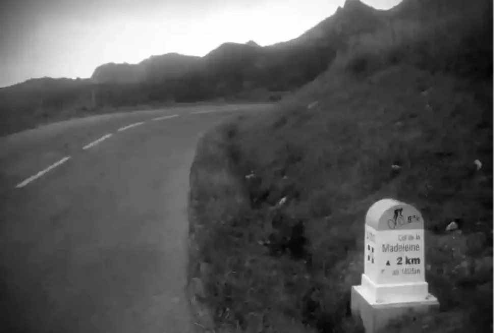 borne on the col de madeleine black and white